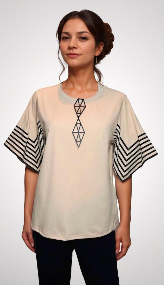 Beige T-shirt with striped sleeves. T-SHIRT ONLY.