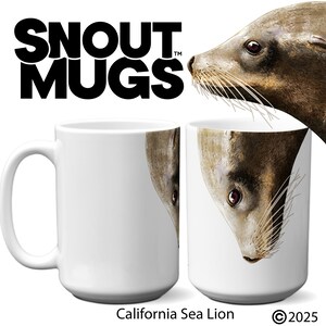 May include: White ceramic coffee mug with a brown and white California sea lion peeking out from the side. The mug has the text "Snout Mugs" printed on the front. The text "California Sea Lion" is printed below the mug.