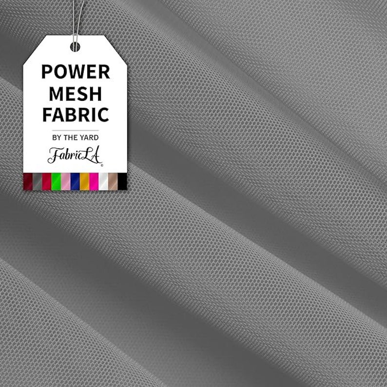 May include: A close-up of gray power mesh fabric with a tag that reads "POWER MESH FABRIC" and "BY THE YARD" with the FabricLA logo. The fabric is folded, showing the texture and weave. A color palette is at the bottom of the tag.