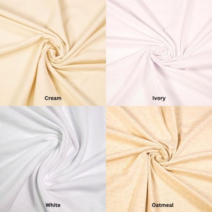 Puede incluir: Cuatro muestras de tela en diferentes tonos de blanco y crema. Las muestras est&aacute;n dispuestas en una cuadr&iacute;cula, con las etiquetas "Crema", "Marfil", "Blanco" y "Avena" debajo de cada muestra.
