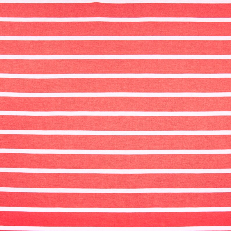 May include: Close-up of a fabric with a repeating pattern of horizontal stripes. The stripes alternate between a vibrant coral-red and crisp white, creating a bold and eye-catching design. The fabric appears to be a lightweight material, suitable for clothing or home decor.