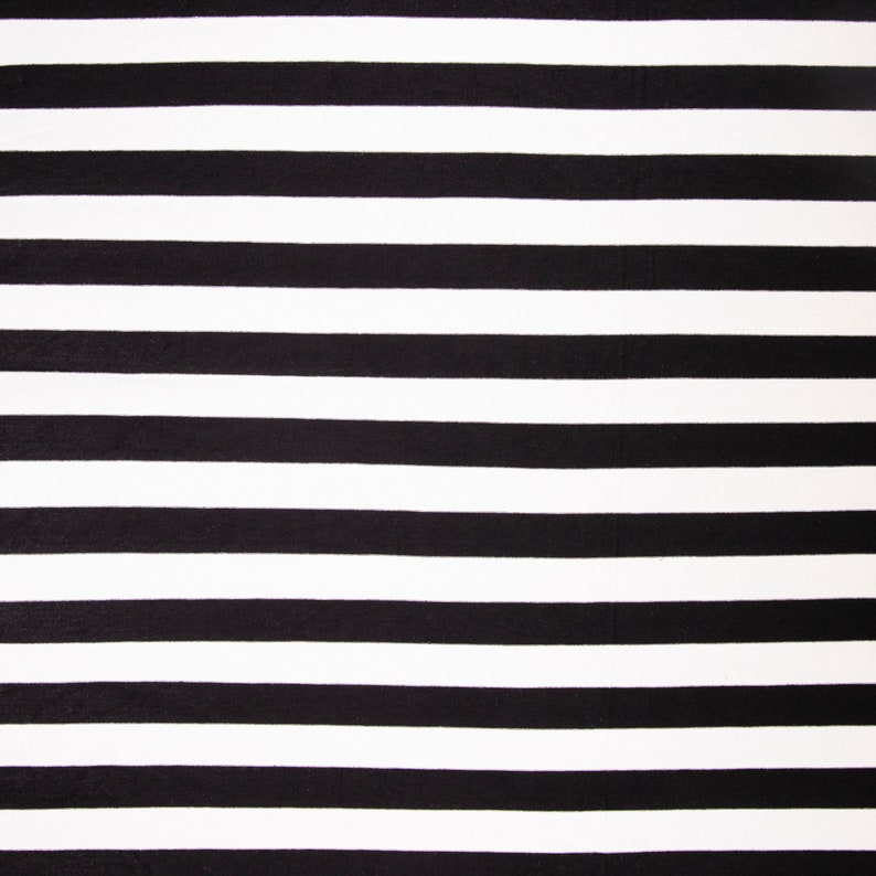May include: A fabric with a bold pattern of horizontal black and white stripes. The stripes are of equal width, creating a classic and graphic design. The alternating pattern provides a strong visual contrast.