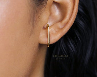 Lower outlet ear cuff
