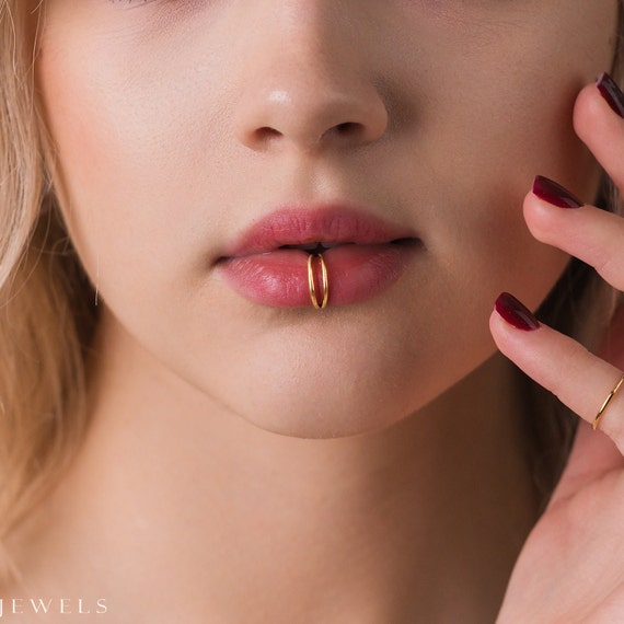 Lip piercing hoop middle deals