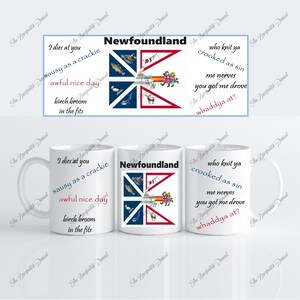 May include: White ceramic mugs with Newfoundland designs. One mug displays the Newfoundland flag and the word "Newfoundland." Other mugs feature phrases such as "I dies at you" and "who knit ya crooked as sin."