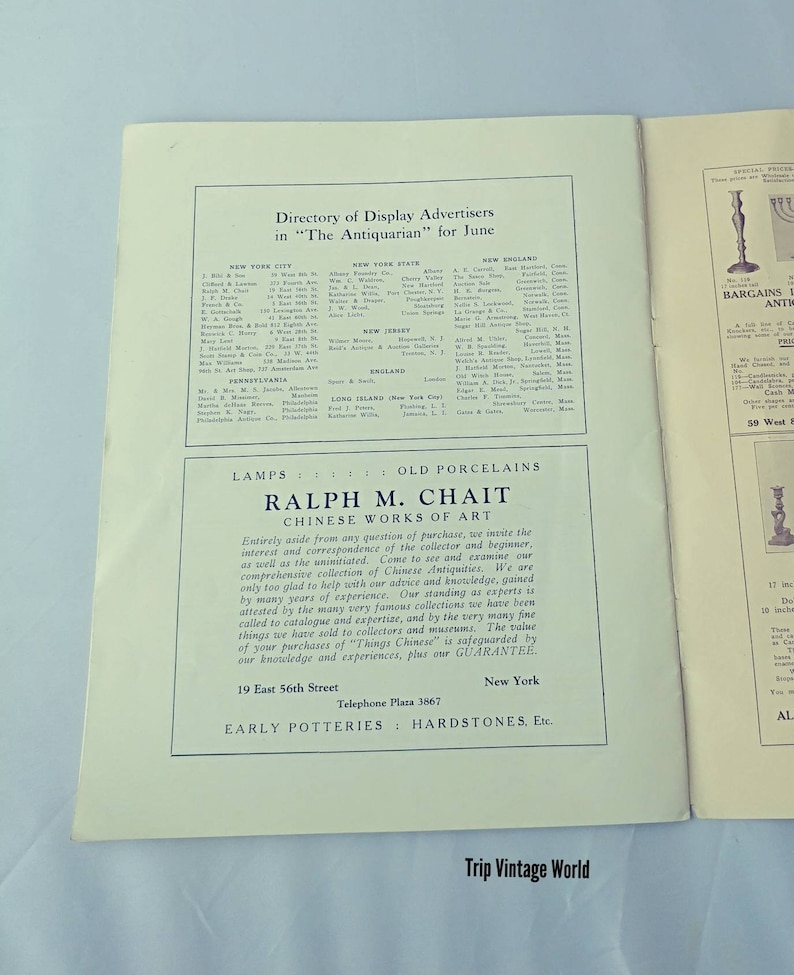 Op de afbeelding: Een zwart-witte pagina uit een antiek tijdschrift met een directory van displayadverteerders voor "The Antiquarian" in juni. De pagina bevat een advertentie voor Ralph M. Chait, een handelaar in Chinese kunstwerken, gevestigd in 19 East 56th Street in New York City.