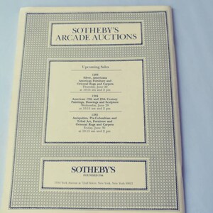 May include: A black and white image of a Sotheby's Arcade Auctions flyer announcing upcoming sales of silver, Americana, American furniture, Oriental rugs and carpets, American 19th and 20th century paintings, drawings and sculpture, and antiquities, Pre-Columbian and Tribal Art, furniture and Oriental rugs and carpets. The flyer lists the dates and times of the sales. The Sotheby's logo is at the bottom of the flyer.