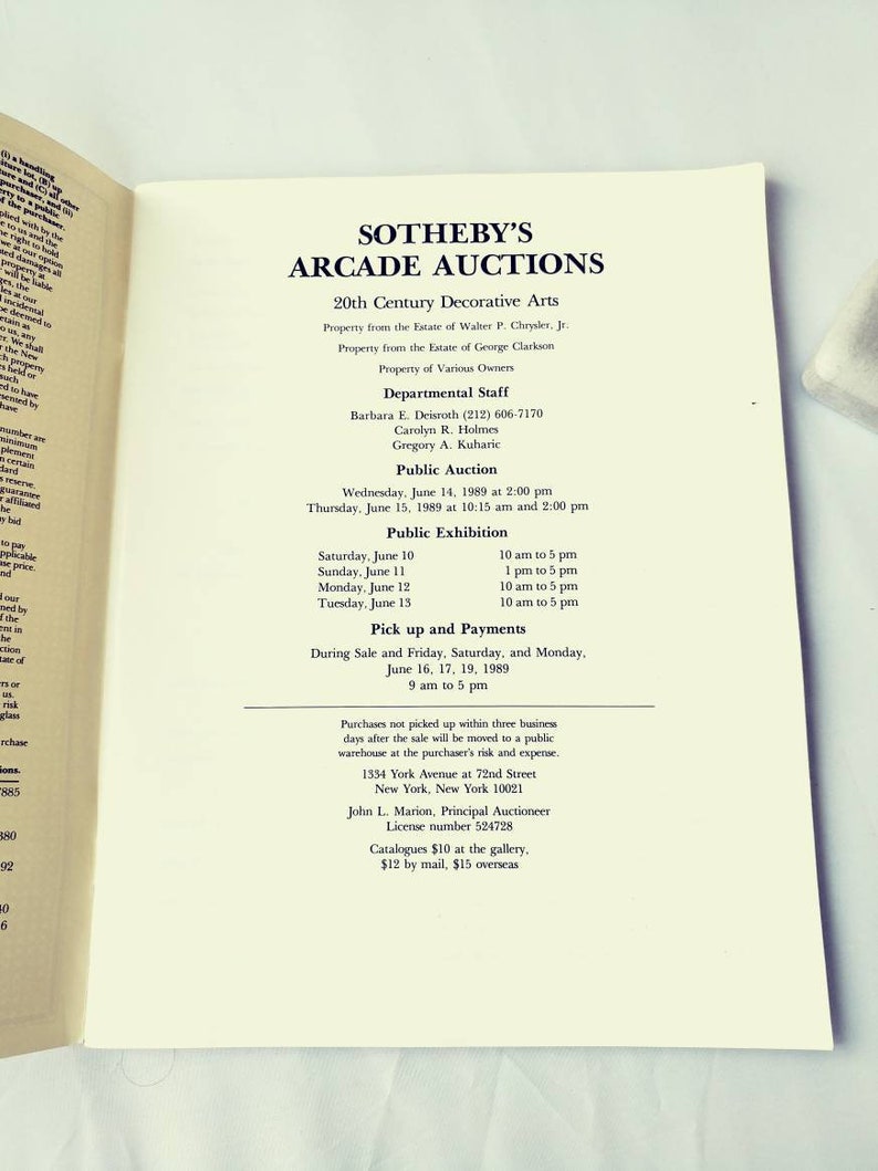 May include: A black and white printed page with the text "SOTHEBY'S ARCADE AUCTIONS 20th Century Decorative Arts" and details about an auction of decorative arts. The auction will take place on June 14th and 15th, 1989, at Sotheby's in New York City.