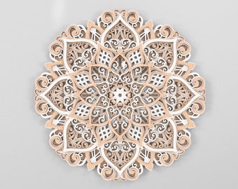 May include: A layered wooden mandala wall art piece. The design features intricate cut-out patterns in shades of light brown, white, and natural wood tones. The circular artwork has a symmetrical floral design, perfect for home decor.