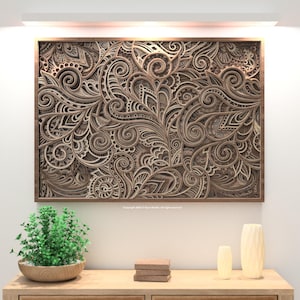 May include: A detailed, layered wooden wall art piece with a brown frame. The artwork features an intricate, swirling floral design in shades of brown and beige. The piece is displayed above a wooden console with decorative items.