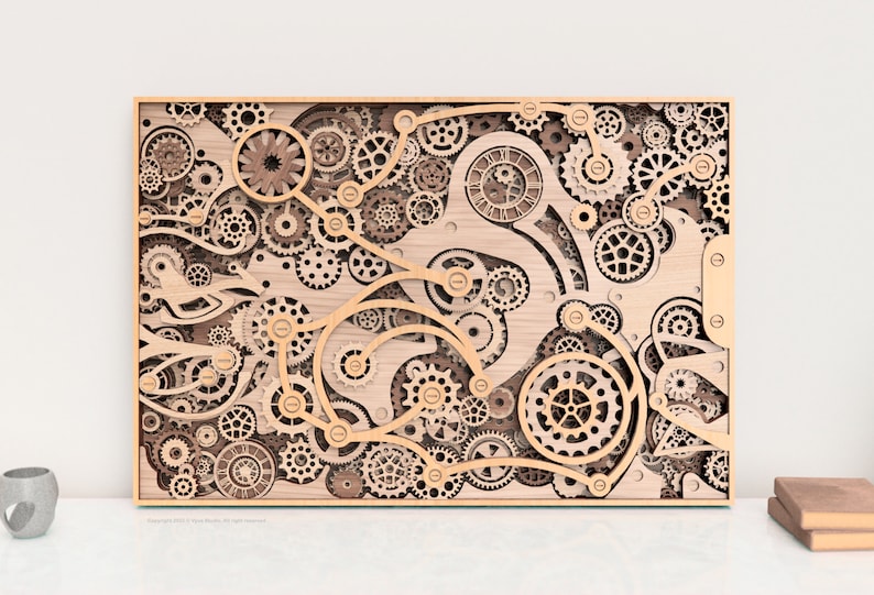 May include: Wooden wall art featuring a complex arrangement of gears, cogs, and mechanical components. The artwork is framed in a light wood, with intricate details and varying sizes of gears. The design evokes a steampunk aesthetic.