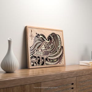 May include: A multi-layered wooden art piece featuring a grand piano with a musical note design. The artwork is framed in light wood and rests on a wooden cabinet. The color palette includes shades of brown, beige, and gray.