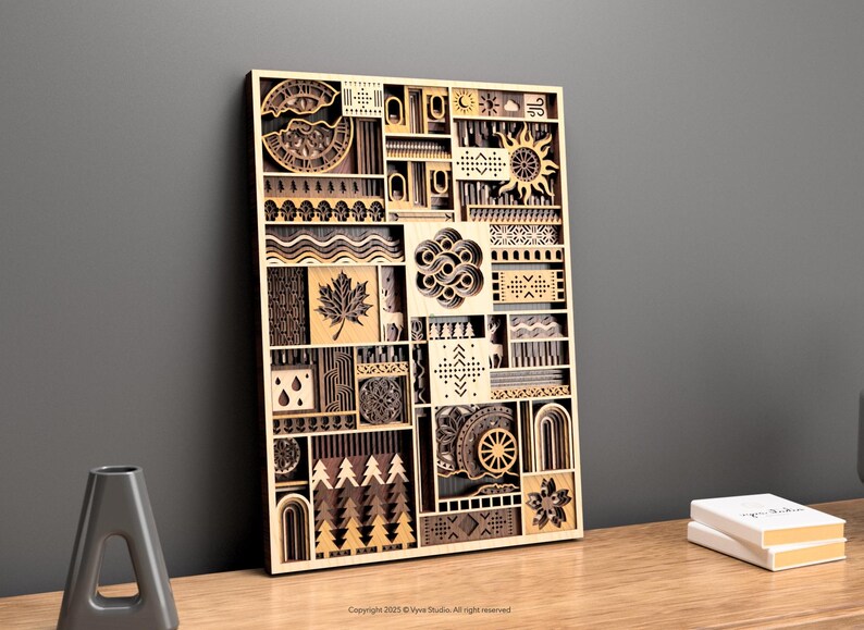 May include: Wooden wall art with a geometric design. The artwork features various shapes and patterns, including a sun, maple leaf, and trees. The piece is made of light-colored wood and is displayed against a gray wall.