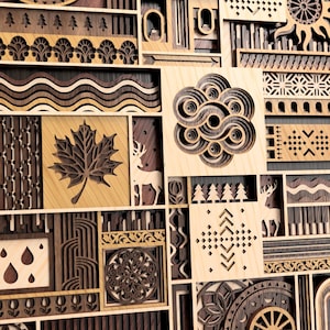 May include: A wooden wall art piece with a geometric design. The artwork features various shapes and patterns, including a maple leaf, deer, and sun. The piece is made of different shades of wood and has a natural, rustic look.
