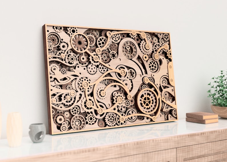 May include: A wooden wall art piece featuring an intricate design of gears and cogs. The piece is made of light brown wood and has a rustic, industrial look.