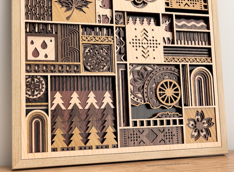 May include: Wooden wall art with a layered design. The artwork features various geometric and nature-inspired shapes, including trees, leaves, and deer, in shades of brown and tan. The piece is framed in light wood.