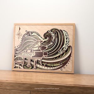 May include: A framed, layered wood art piece depicting a grand piano with a wave-like design. The artwork features shades of brown, green, and tan, with musical notes and a treble clef. The frame is made of light-colored wood.