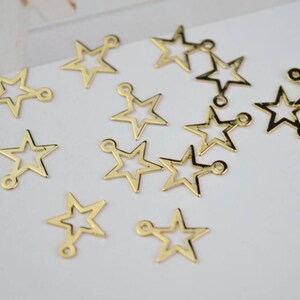 20 of star charm pendant 9x9mm / gold plated