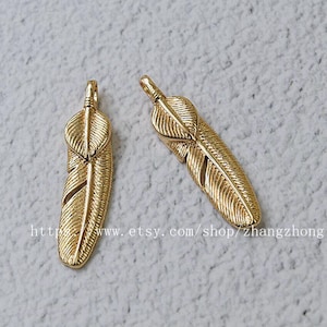 2 of feather charm pendant