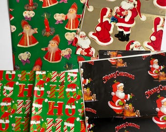 May include: A collection of Christmas-themed wrapping paper sheets. Designs include Santa Claus, candles, and the words "Merry Christmas" in red and white on green, gold, and black backgrounds. Some sheets feature the letters "HO" in a festive pattern.