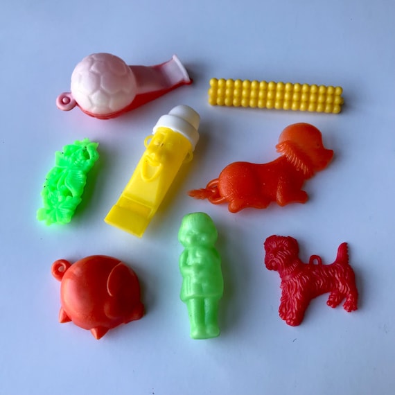 Vintage plastic cracker toys party favours.