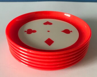 Vintage plastic drinks coasters, playing card design.