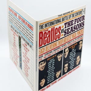 May include: A two-record set titled "The International Battle of the Century" featuring The Beatles vs. The Four Seasons. The cover has a red, white, and black design with images of the bands and song lists. Includes scorecards and biographies.