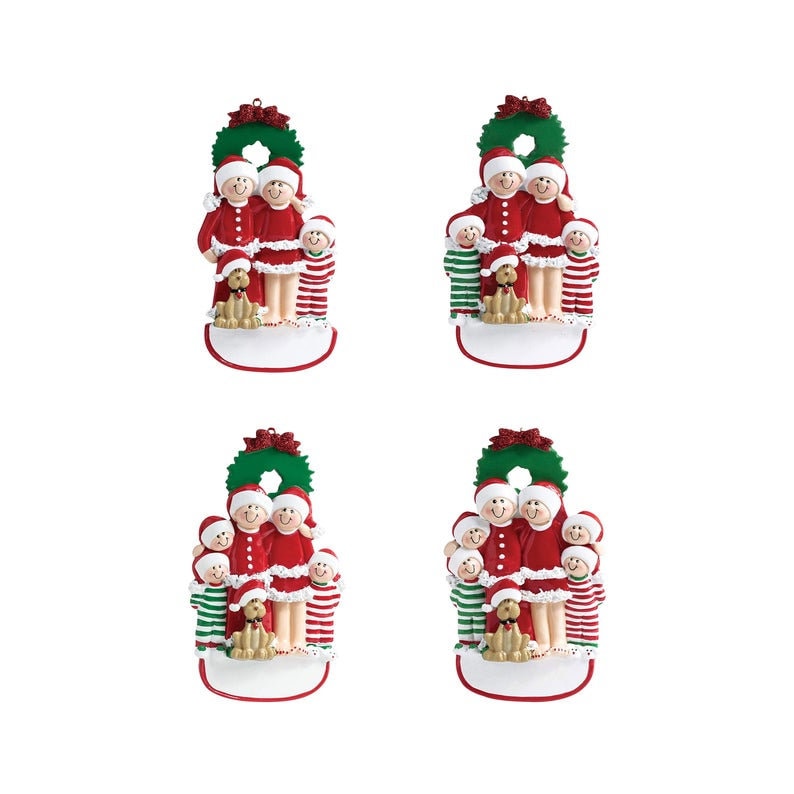 May include: A set of four personalized Christmas ornaments featuring a family of five with a dog. The ornaments are white with a green wreath at the top and a blank space for personalization. The family is dressed in red and white pajamas with green and white striped accents. The dog is wearing a red collar.