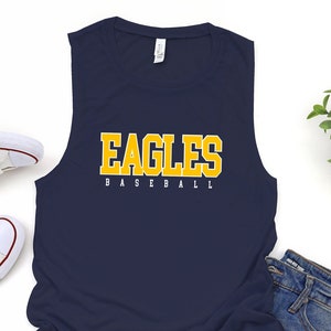 May include: A navy blue sleeveless tank top with the words "Eagles Baseball" in yellow letters.