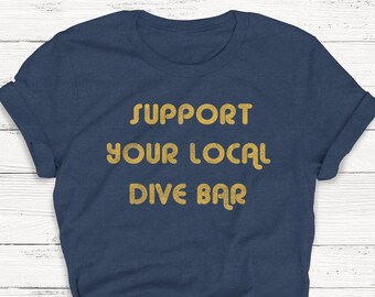 Maglietta con grafica retrò "Support Your Local Dive Bar"