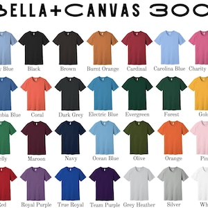 May include: A color chart of Bella+Canvas 3001 t-shirts in various colors, including Baby Blue, Black, Brown, Burnt Orange, Cardinal, Carolina Blue, Charity Pink, Columbia Blue, Coral, Dark Grey, Electric Blue, Evergreen, Forest, Gold, Kelly, Maroon, Navy, Ocean Blue, Olive, Orange, Pink, Red, Royal Purple, True Royal, Team Purple, Grey Heather, Silver, and White.