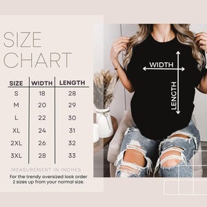 May include: A black t-shirt with white arrows indicating width and length. A size chart displays measurements in inches for sizes S to 3XL. The chart includes width and length measurements, with instructions for an oversized fit.