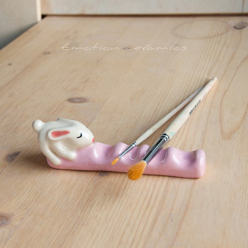 Ceramic paint brush rest with the sleepy white bunny. Art Etsy