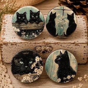 May include: Four round decorative cat-themed images. Each features a black cat with green or blue eyes. One image shows two cats peering over a fence. Another shows two cats near a vase of flowers. The other two show close-up cat portraits.