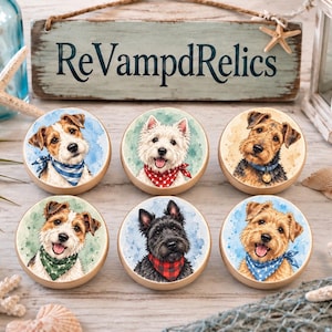 May include: Six round wooden drawer knobs featuring watercolor-style illustrations of various dog breeds. Each dog wears a colorful patterned bandana, including plaid, polka dot, and striped designs, set against soft blue and green painted backgrounds.
