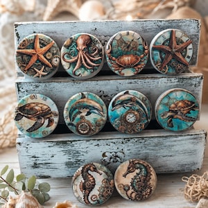 May include: A collection of round decorative magnets featuring marine life designs, including starfish, an octopus, a crab, dolphins, sea turtles, and seahorses. The magnets have a steampunk aesthetic with clockwork and gears, set against a blue and teal background.