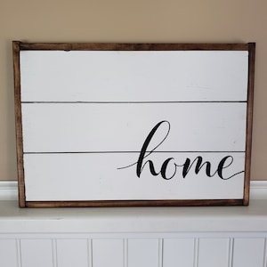 Rustic shiplap framed home sign