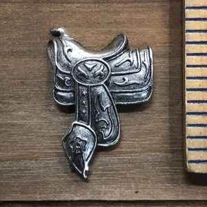 Large Cowboy Saddle Stamping, Finding. Solid Brass, USA Made.