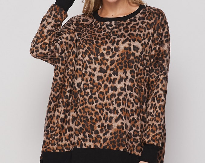 Cheetah print oversized top with black trim