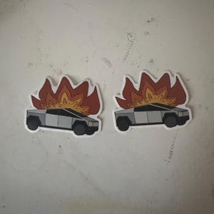 Adesivo anticapitalista Tesla Cybertruck in fiamme