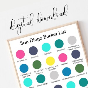 May include: A printable San Diego bucket list with colourful circles representing different attractions. The list includes Sea World, Balboa Park, Fort Rosecrans National Cemetery, Old Town, La Jolla Sea Caves Kayak Tour, La Jolla Cove Sea Lions, Safari Park, San Diego Zoo, Old Point Loma Lighthouse, Seaport Village, Belmont Park, Windansea Beach, Coronado Island, and Watch a sunset at Sunset Cliffs.