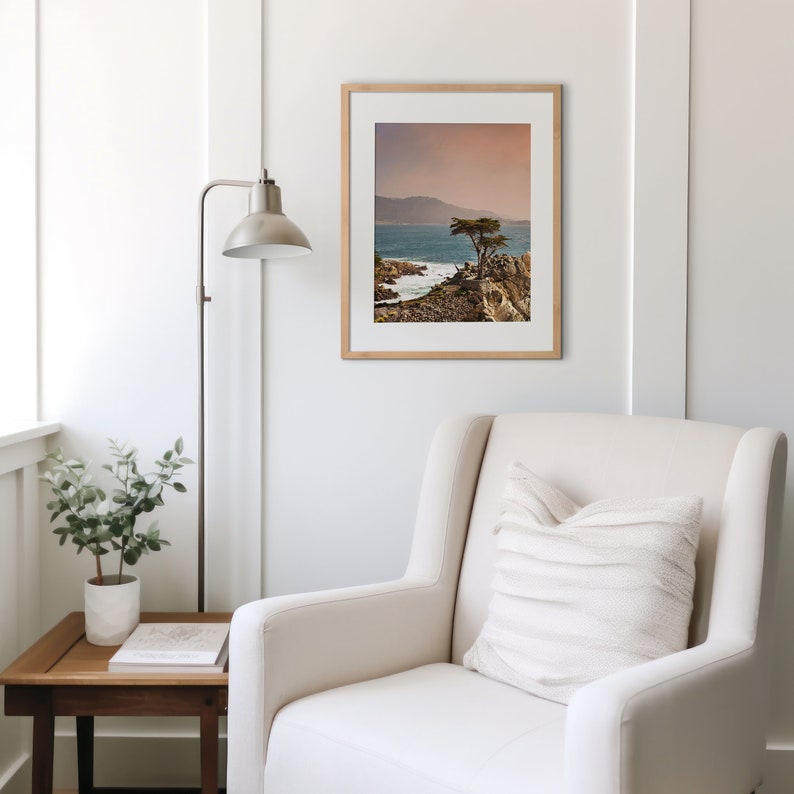 Lone Cypress Photography Print in frame hanging above chair in living room