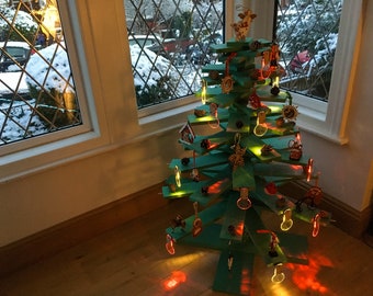 Eco friendly Christmas Tree. Modern, contemporary, stylish, minimalist, recycled, environmentally conscious, sustainable, wooden TreeFirLife