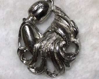 Vintage Aquarius necklace by daco silver tone zodiac statement piece
