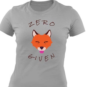 May include: A gray t-shirt with a cartoon fox face and the text "ZERO GIVEN" printed on it.
