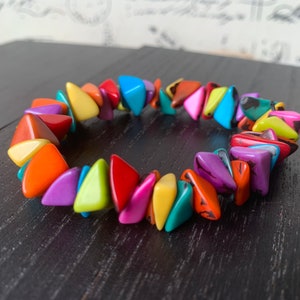 Rainbow beaded bracelet Tagua nut jewelry Mothers day gifts Pride bangle Artsy gifts Fun unusual bracelet Art to wear Spring fashion 2025