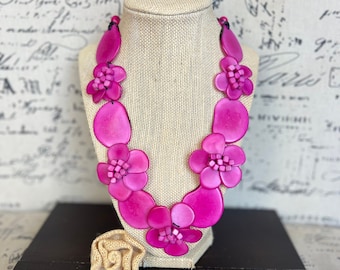Pink flower statement necklace Tagua jewelry Spring fashion trends Big bold chunky necklace Easter outfit style Double layer bib Mothers day