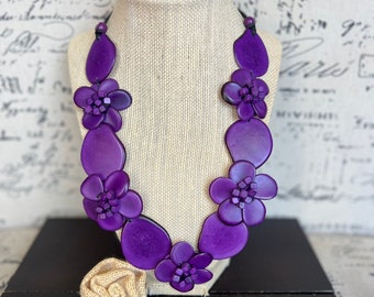 Purple flower statement necklace Tagua jewelry Spring fashion trends Big bold chunky necklace Easter outfit style Floral design Mothers day