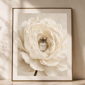 May include: A framed wall art print featuring a large, cream-coloured peony flower with a small glass vial placed in the centre. The vial has a silver cap and a white label with the black text BOTULINUM TOXIN printed on the front surface.