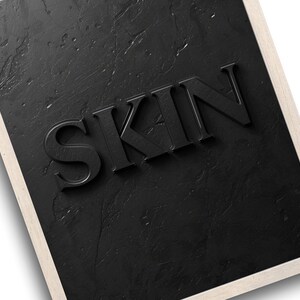 Minimalist printable wall art featuring the word "SKIN" embossed on a lightly textured, black concrete-style background, perfect for esthetician, dermatology office, med spa, or skincare gift decor.